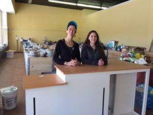 Scrap Exchange store manager Madeline James and Cascade Alliance member liaison Bethany Rockwell at the retail thrift popup shop in Durham NC. They were ready for the customers that lined up an hour before the shop opened. Sales that day were brisk.