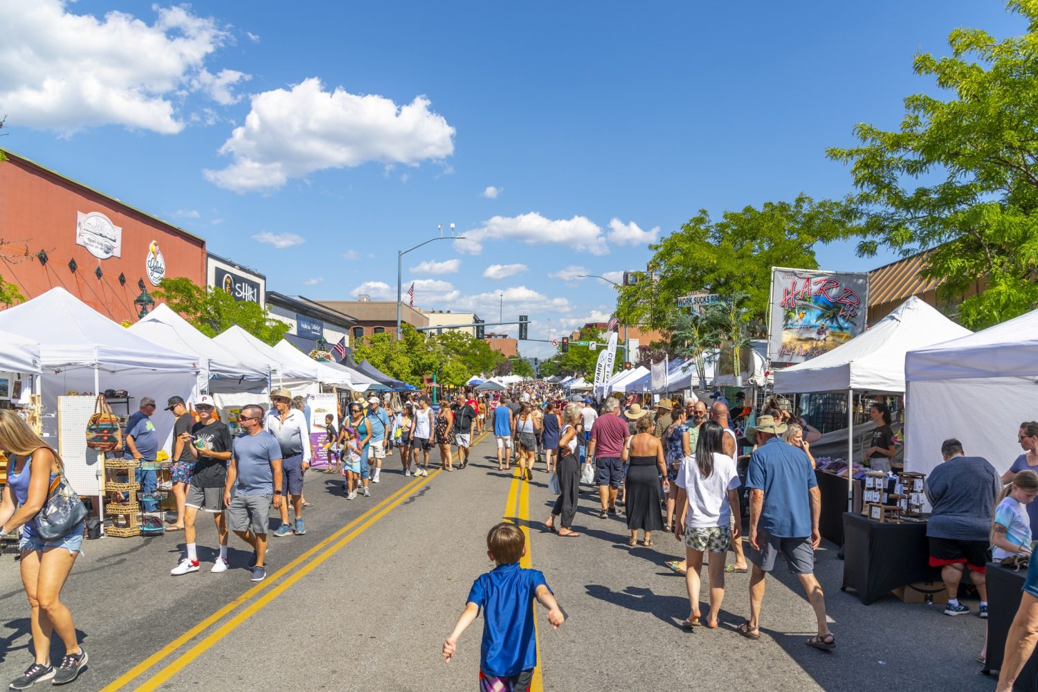 The annual Arts and Crafts Street Fair with vendors selling food, gifts and art products along main street Sherman Avenue, and through city park in the lakefront tourist resort town of Coeur d’Alene, Idaho.… Read More