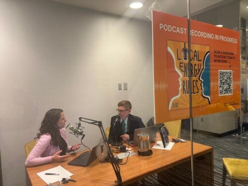 Citizens Utility Board of Minnesota Executive Director Annie Levenson-Falk with John Farrell of ILSR