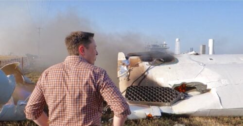 Elon Musk surveys one of Space X crashed rockets