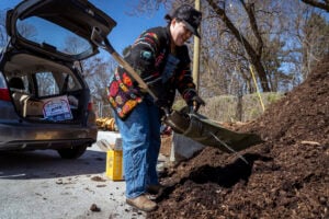 Filling bag of compost at Fairmount Park Organic Recycling Center. Credit: Philadelphia Parks and Recreation